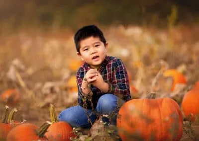 Boy with pumpkins