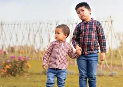 brothers holding hands